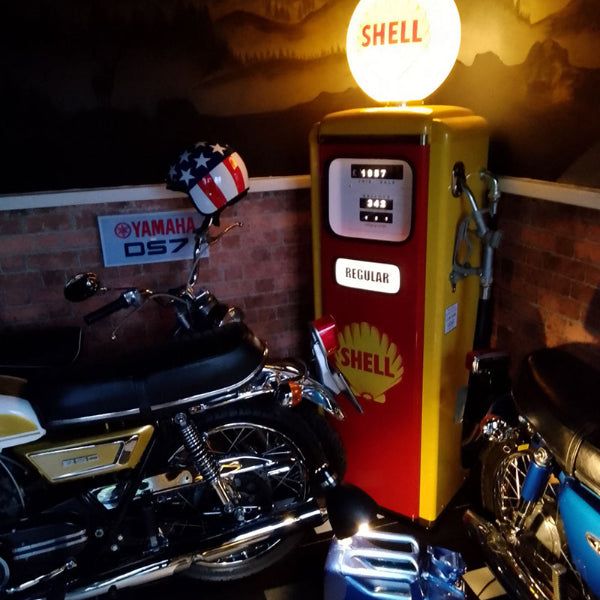 Shell retro gas pump in garage