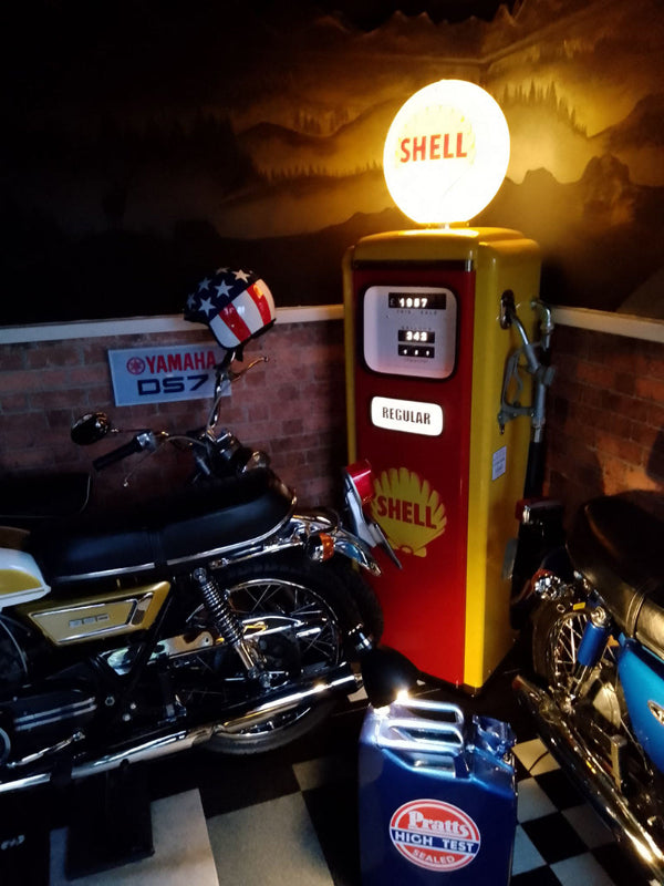 Shell retro gas pump in garage